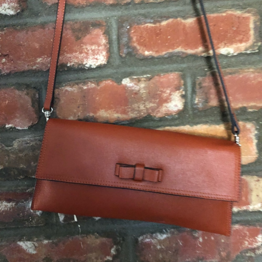 Super adorable leather purse with bow tie